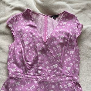 pink and white floral mini dress with ruffles a wrap style and a b neck jcrew